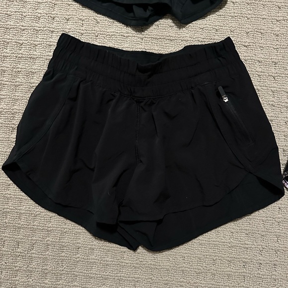 4 pairs of Lululemon shorts. Excellent used condition. - Picture 3 of 5
